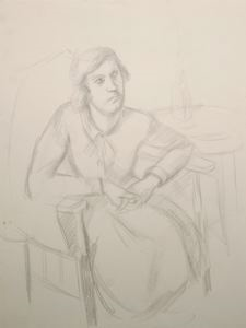 Image of Younger Woman in Chair with Folded Hands